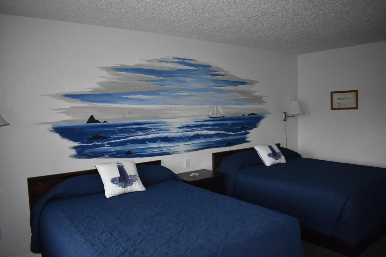 Lighthouse Cove Inn Bandon Buitenkant foto A room at the motel