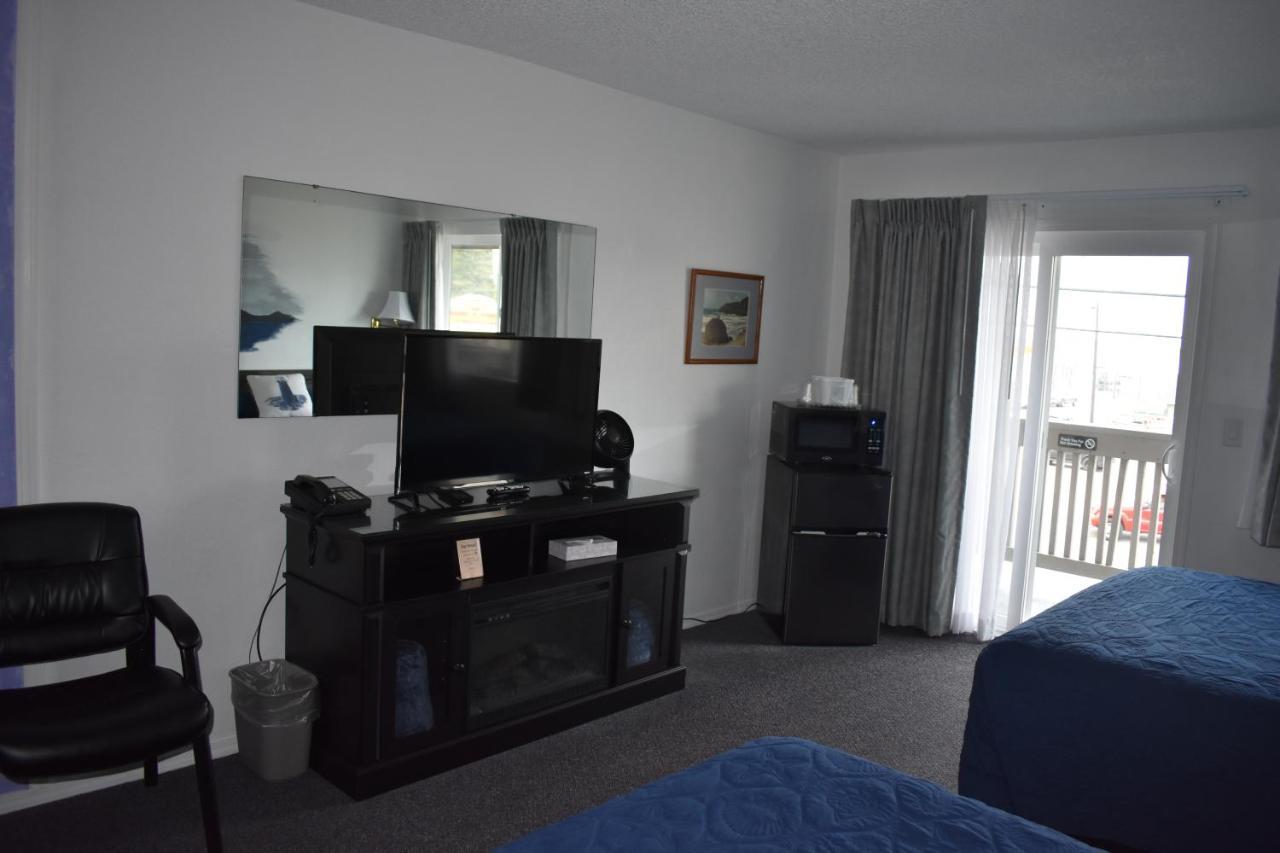 Lighthouse Cove Inn Bandon Buitenkant foto A typical room at the motel